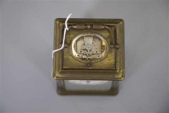A late 19th century French lacquered brass hour repeating carriage clock, width 3.5in. depth 3.25in. height 5.5in.